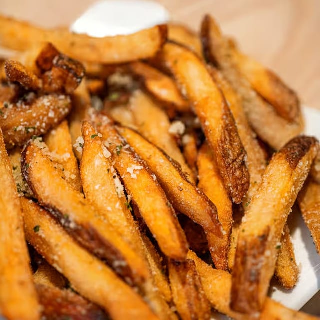 Hatch Chili or Parmesan Truffle Seasoned Fries.